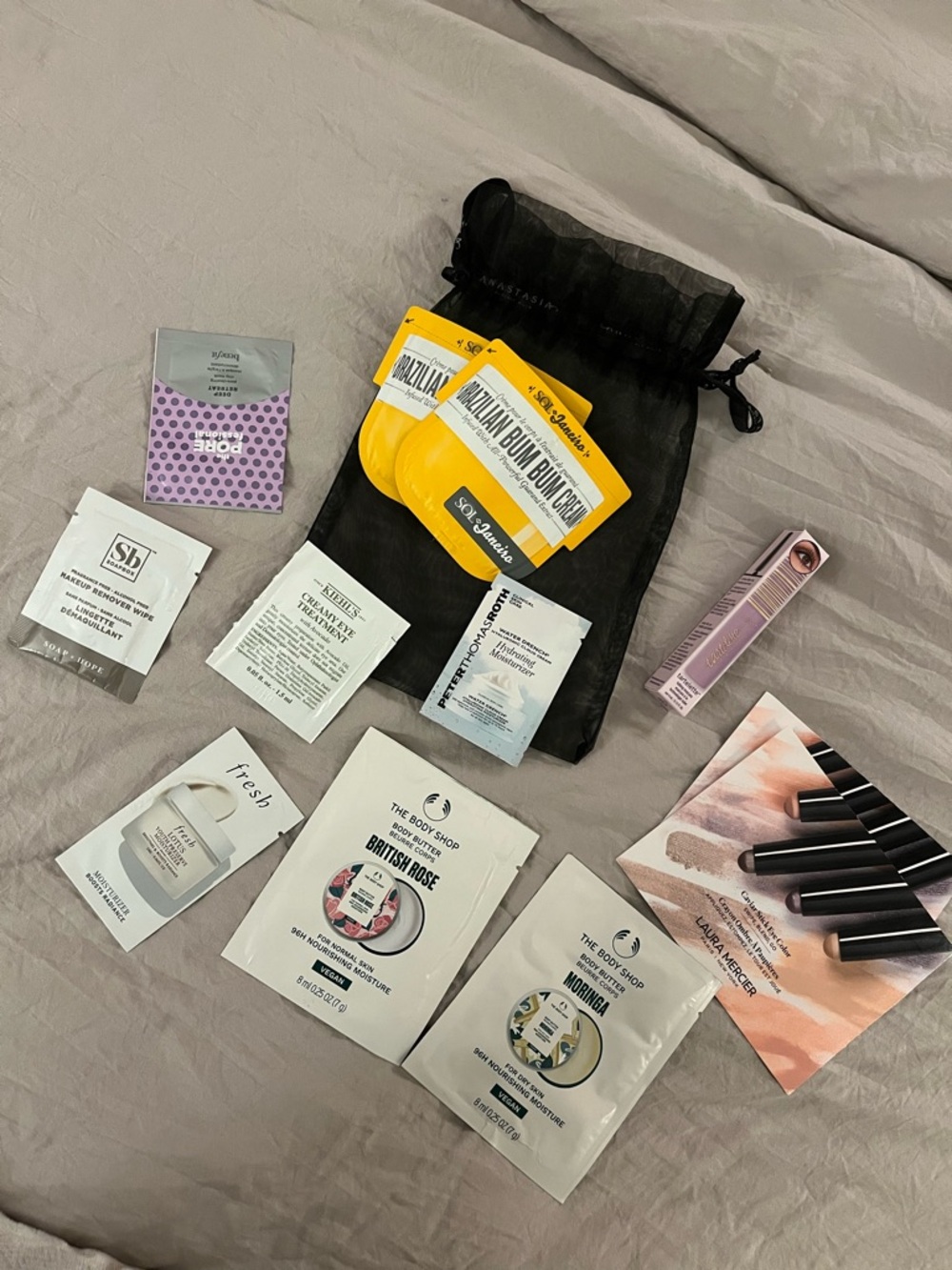 Makeup & Skincare Sample Kit with Black Organza Bag